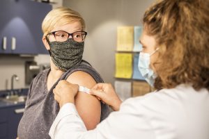 Woman receiving a covid vaccine