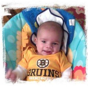 Picture of Brady wearing a Bruins Hockey shirt