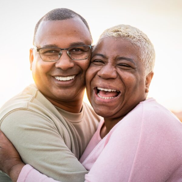 Happy,Latin,Senior,Couple,Having,Romantic,Moment,Embracing,On,Rooftop