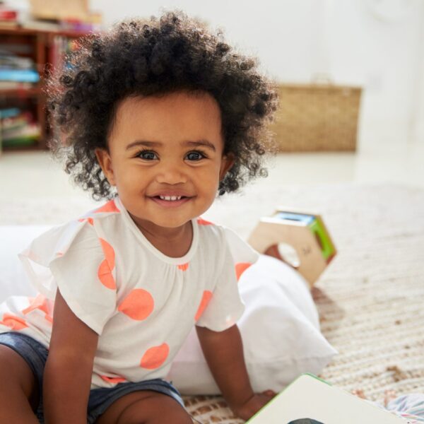 Portrait,Of,Happy,Baby,Girl,Playing,With,Toys,In,Playroom